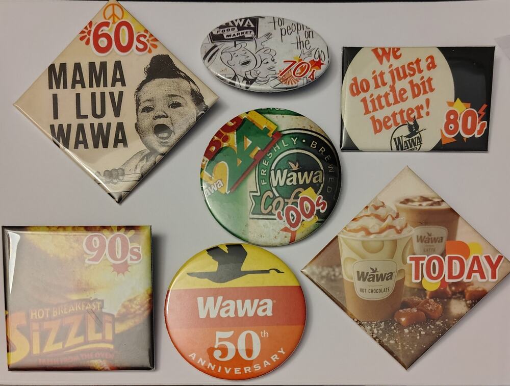 #0111 - WAWA DECADES COLLECTIBLE PROMO BUTTONS - 7 PIECES